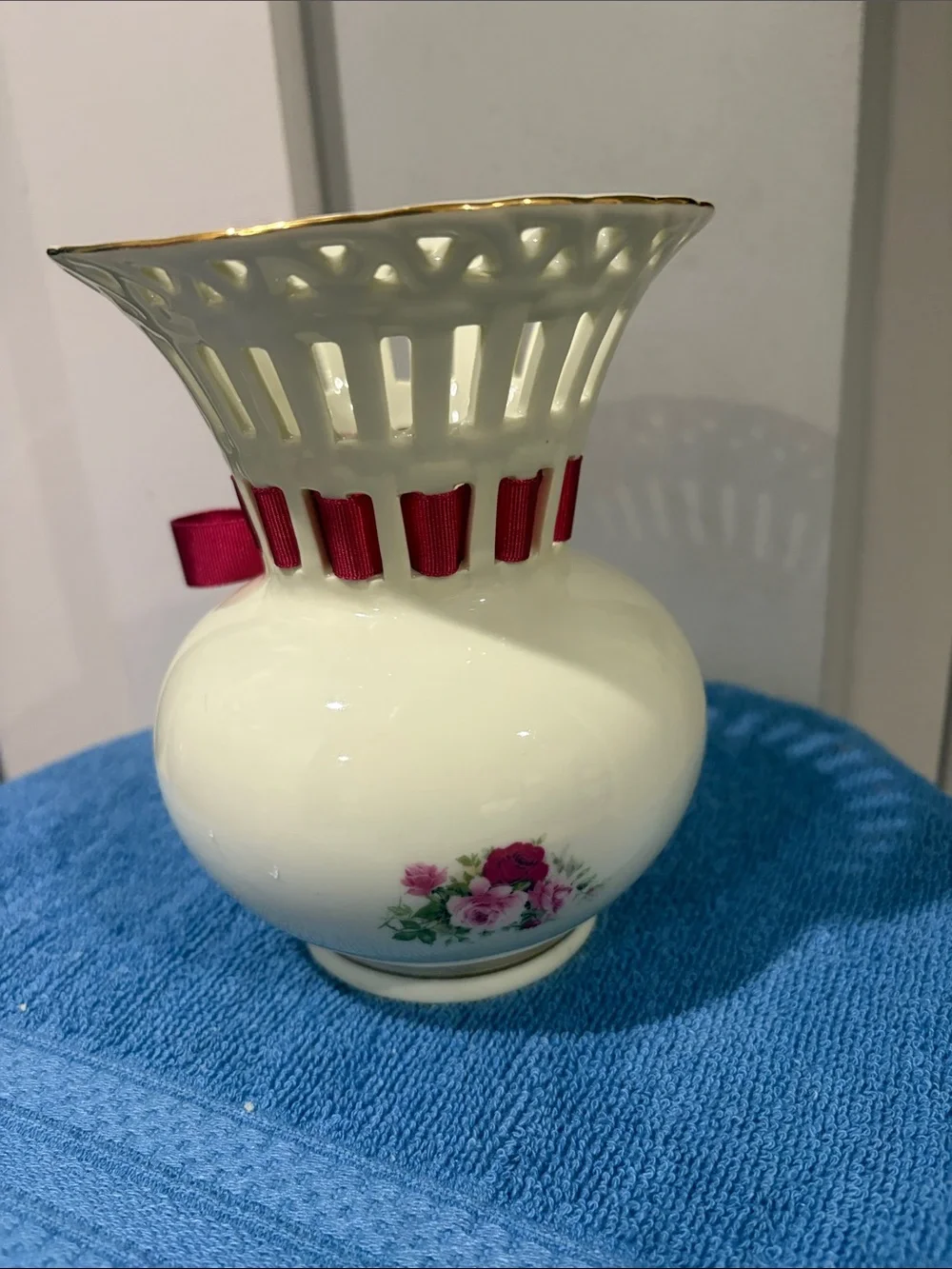 Cream Porcelain Floral Bud Vase with Pink Ribbon Accent